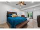 Bedroom featuring a ceiling fan, wood floors, and access to the outdoors at 4030 River Ridge Chase Se, Marietta, GA 30067