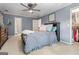 Cozy bedroom featuring a ceiling fan and complemented by an attached walk-in closet at 4030 River Ridge Chase Se, Marietta, GA 30067