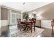 Dining room featuring elegant décor, hardwood floors, and natural light at 4030 River Ridge Chase Se, Marietta, GA 30067