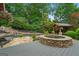 Relaxing backyard with a custom stone hot tub, pool and gazebo at 4030 River Ridge Chase Se, Marietta, GA 30067
