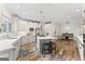 Bright kitchen features an island with seating, stainless appliances, and decorative wood flooring at 4030 River Ridge Chase Se, Marietta, GA 30067