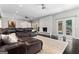 Spacious living room with hardwood floors, brick fireplace, recessed lighting and glass door to outside at 4030 River Ridge Chase Se, Marietta, GA 30067