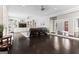 Large living room featuring custom built-ins, dark hardwood floors, recessed lighting and comfortable seating at 4030 River Ridge Chase Se, Marietta, GA 30067