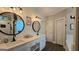 Bathroom features a double sink vanity, modern lighting, and separate shower at 100 Rabbits Run, Fayetteville, GA 30214