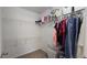 Walk-in closet with wire shelving, hanging racks, and ample storage for clothes and accessories at 100 Rabbits Run, Fayetteville, GA 30214