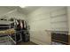 Spacious walk-in closet with ample storage space and custom shelving for organization at 100 Rabbits Run, Fayetteville, GA 30214