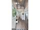 Inviting foyer with high ceilings, wood floors, and an open view into other living spaces at 100 Rabbits Run, Fayetteville, GA 30214