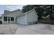 Two-car garage with an extended driveway at 100 Rabbits Run, Fayetteville, GA 30214