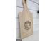 Cutting board featuring the City of Fayetteville seal on a white quartz countertop at 100 Rabbits Run, Fayetteville, GA 30214
