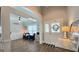 Bright living room features wood floors, large windows, and an open concept design at 100 Rabbits Run, Fayetteville, GA 30214