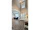 Bright living room features wood floors, large windows, and an open concept design at 100 Rabbits Run, Fayetteville, GA 30214