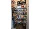 This walk-in pantry features metal shelving full of groceries and canned goods at 100 Rabbits Run, Fayetteville, GA 30214