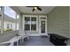 Cozy screened porch with comfortable seating and plenty of natural light at 100 Rabbits Run, Fayetteville, GA 30214