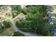 Aerial view of a spacious home with a large, wooded lot at 265 Beverly Farms Dr, Sharpsburg, GA 30277