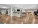 Finished basement featuring a bar, multiple TVs, and ample seating at 265 Beverly Farms Dr, Sharpsburg, GA 30277