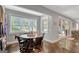 Basement dining room adjacent to the sliding door for easy outdoor access at 265 Beverly Farms Dr, Sharpsburg, GA 30277