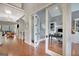 Elegant foyer with hardwood floors and an open view to the living and dining areas at 265 Beverly Farms Dr, Sharpsburg, GA 30277