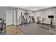 Exercise room with various machines and free weights for a complete workout experience at 265 Beverly Farms Dr, Sharpsburg, GA 30277