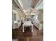 Spacious gourmet kitchen featuring a large island, white cabinets, and stainless steel appliances at 265 Beverly Farms Dr, Sharpsburg, GA 30277