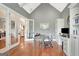 Bright office features custom built-ins, hardwood floors, and glass French doors at 265 Beverly Farms Dr, Sharpsburg, GA 30277