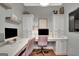 Functional home office with built-in cabinets, marble countertops, and plenty of natural light at 265 Beverly Farms Dr, Sharpsburg, GA 30277