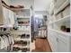 Spacious walk-in closet with custom shelving providing ample storage for clothing and accessories at 265 Beverly Farms Dr, Sharpsburg, GA 30277