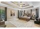 Spacious main bedroom with a tray ceiling, neutral tones, and ample natural light at 931 Hidden Falls Se Ln, Smyrna, GA 30082