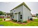 View of the rear of the house and the backyard at 309 Dean Ct, Temple, GA 30179
