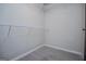 Walk-in closet with installed shelving, ready for organization at 309 Dean Ct, Temple, GA 30179
