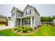 View of the right side of the house and the landscaping at 309 Dean Ct, Temple, GA 30179