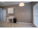 Bright kitchen featuring a desk area, neutral walls, and checkered flooring at 2938 Cottesford Se Way, Smyrna, GA 30080