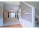 Spacious living room with natural light, neutral carpet, and staircase entry at 2938 Cottesford Se Way, Smyrna, GA 30080