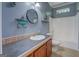 Nautical themed bathroom with decor, neutral tile, and a shower-tub combination at 315 Jewel Ln, Covington, GA 30014