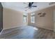 Bright bedroom featuring modern wood-look floors, neutral walls, and ample natural light at 315 Jewel Ln, Covington, GA 30014