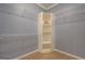Walk-in closet with wire shelving and a corner storage unit providing ample storage at 315 Jewel Ln, Covington, GA 30014