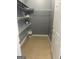 Pantry with wire shelving, tile floor and neutral paint, offering ample storage at 315 Jewel Ln, Covington, GA 30014