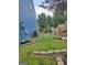 Fully fenced backyard with retaining walls and gate offers privacy and security for outdoor enjoyment at 2540 Picardy N Cir # B, South Fulton, GA 30349