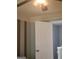 Neutral toned bedroom featuring wall stripes and a ceiling fan at 2540 Picardy N Cir # B, South Fulton, GA 30349