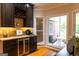 Bright kitchen featuring a bay window with views of the backyard at 30 Carolyn Ct, Social Circle, GA 30025