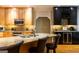 Kitchen island featuring a breakfast bar, and light-wood cabinets at 30 Carolyn Ct, Social Circle, GA 30025