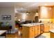 Open concept kitchen featuring light-wood cabinets at 30 Carolyn Ct, Social Circle, GA 30025