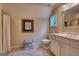 Well-lit bathroom featuring white cabinets, a ceramic tile floor, and a shower with a curtain at 223 Old Rome Rd, Kingston, GA 30145