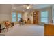 Bright bonus room with seating, desk, and shelving at 223 Old Rome Rd, Kingston, GA 30145