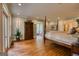 Spacious bedroom with hardwood floors, natural light, and a private sunroom at 223 Old Rome Rd, Kingston, GA 30145