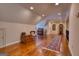Large bonus room with wood floors, seating, and natural light at 223 Old Rome Rd, Kingston, GA 30145
