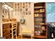 Walk-in closet with shelving, vanity, bench seat, and curated decor at 223 Old Rome Rd, Kingston, GA 30145