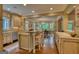 Bright kitchen features an island with bar seating and opens up to an elegant dining area at 223 Old Rome Rd, Kingston, GA 30145