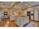 Spacious kitchen featuring a center island, granite countertops and stainless steel appliances at 223 Old Rome Rd, Kingston, GA 30145