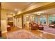 Spacious living room featuring leather seating, a fireplace, and stylish decor at 223 Old Rome Rd, Kingston, GA 30145