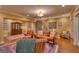 Spacious living room with leather sofas, and rugs, featuring stylish decor at 223 Old Rome Rd, Kingston, GA 30145